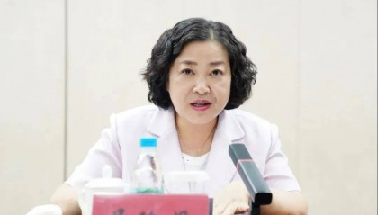 屈玲妮，被查