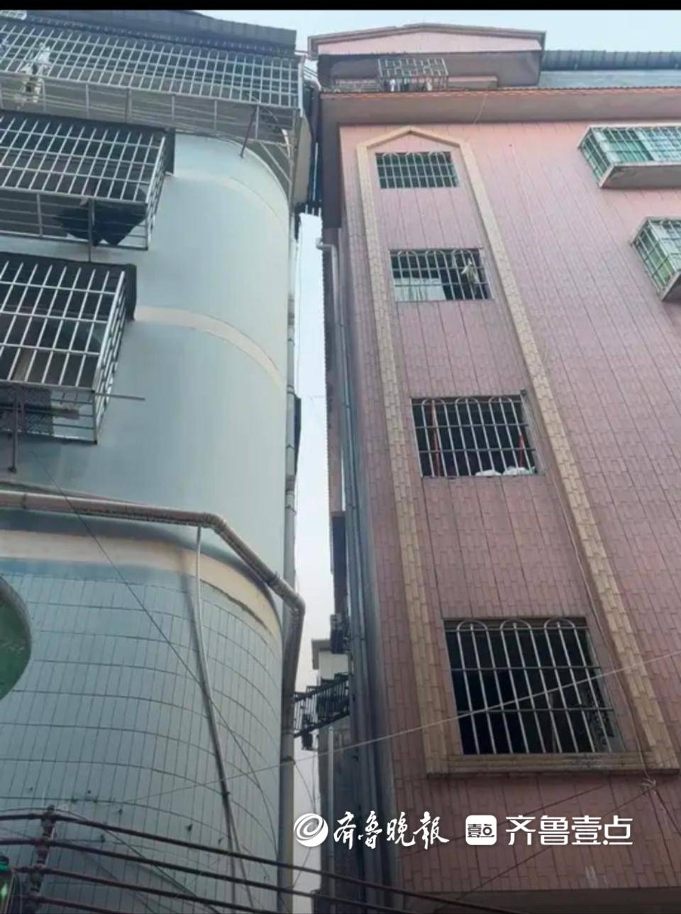 廣州震后出現(xiàn)樓體傾斜，與旁邊樓貼在一起，居委會：正在安全檢測